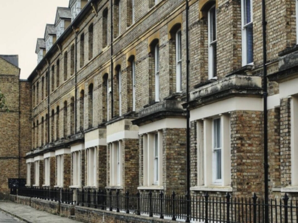 Victorian terraced houses on a cobbled street in Oxford, UK
